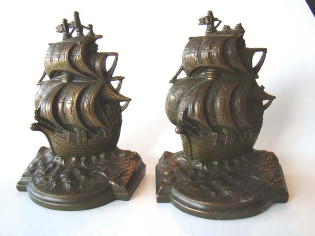 A near 'mint' condition pair of vintage "Galleon 1558-1608" bookends by Jennings Brothers circa 1930